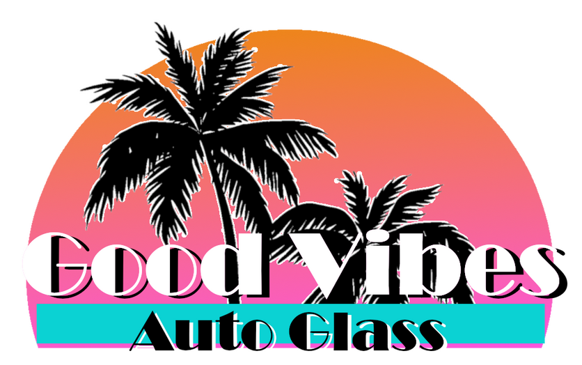The Good Vibes Auto Glass Logo, a sunset behind a silhouette of palm trees, with text in front.